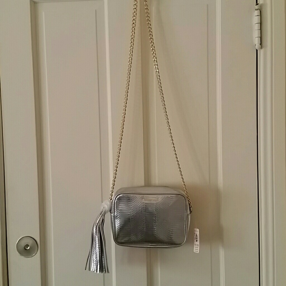 NWT. Victoria  Secret silver crossbody  pu…